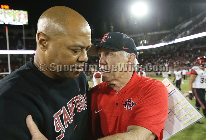 20180831SanDiegoatStanford-24.JPG - Stanford Cardinal head coach David Shaw (left) and San Diego State head coach Rocky Long greet each other following an NCAA football game in Stanford, Calif. on Friday, August 31, 2017. Stanford defeated San Diego State 31-10.